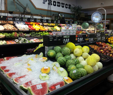 Anderson's Grocery produce section with watermelons in the foreground.