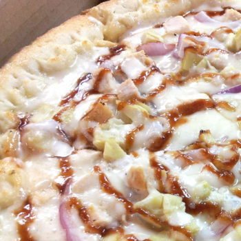 Chicken, artichoke, red onions, ranch dressing, and a hint of barbecue sauce at Republic Pizza Co.