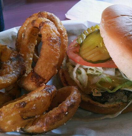 Burger with a side of onion rings. Yum!