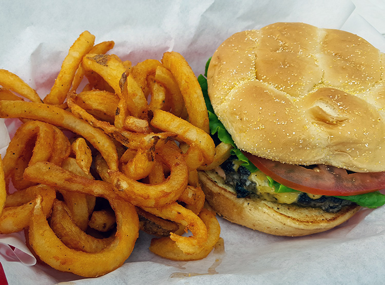 A great burger and excellent curly and regular fries.