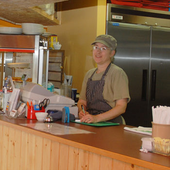 Republic Pizza Co. owner, Ann at order counter.