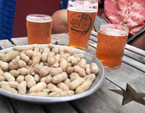 Enjoying three exceptional lagers at the pub.