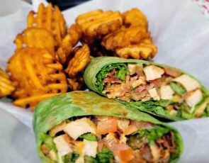Buckhorn wrap: Chicken, bacon, grilled onions, tomatoes, cheddar cheese and their Signature Buckhorn BBQ sauce.